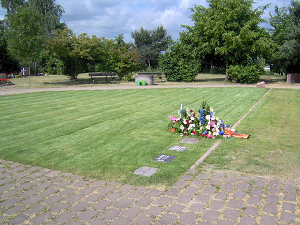 Urnenrasengrab auf dem Friedhof